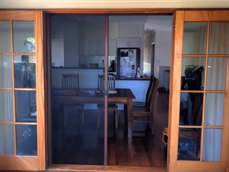 Retractable Screen installed on timber French Doors