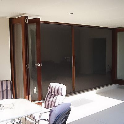 Timber bifold doors matching retractable screen